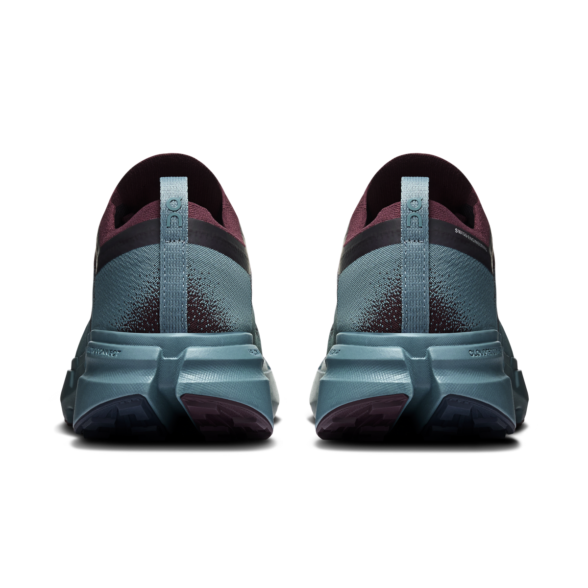 Shoe heels view with maroon collar, speckled blue upper, and light-blue outsole tread
