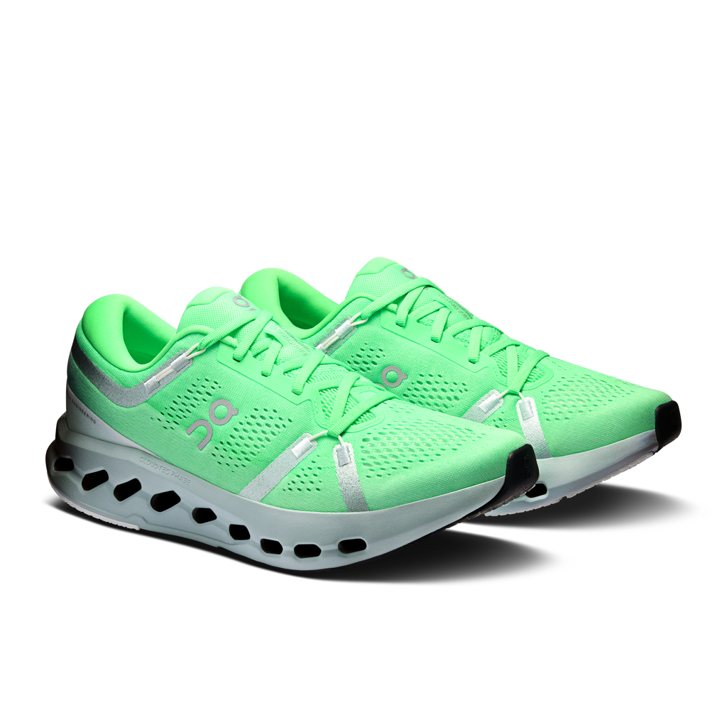 Men's green running shoes, lace-up with silver logo and CloudTec cushioning sole