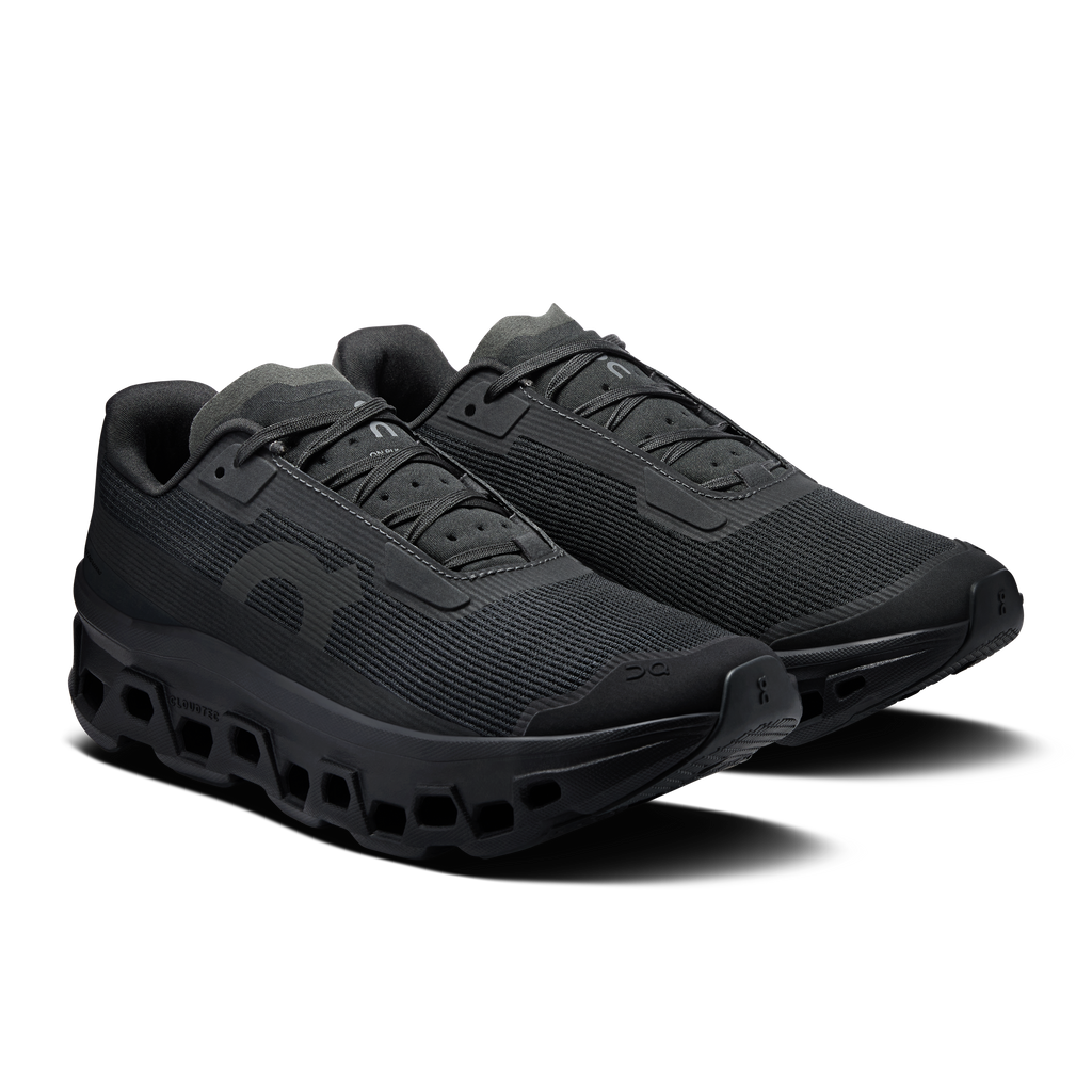 Women's black lace-up running shoes with padded tongue and CloudTec pods outsole