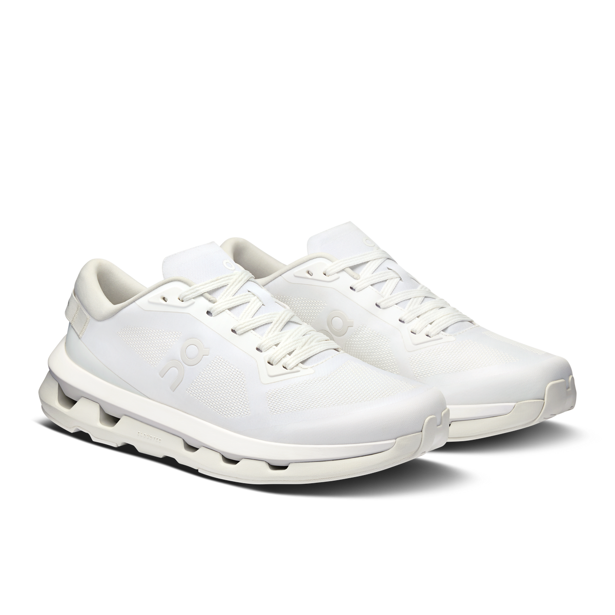 On Cloudzone women's running shoes, white lace-up sneakers with curved CloudTec midsole