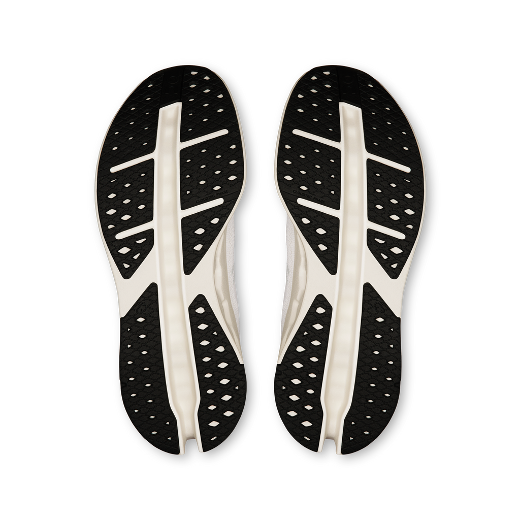 On Cloudsurfer Max white shoe outsole, black traction pods with white support lines