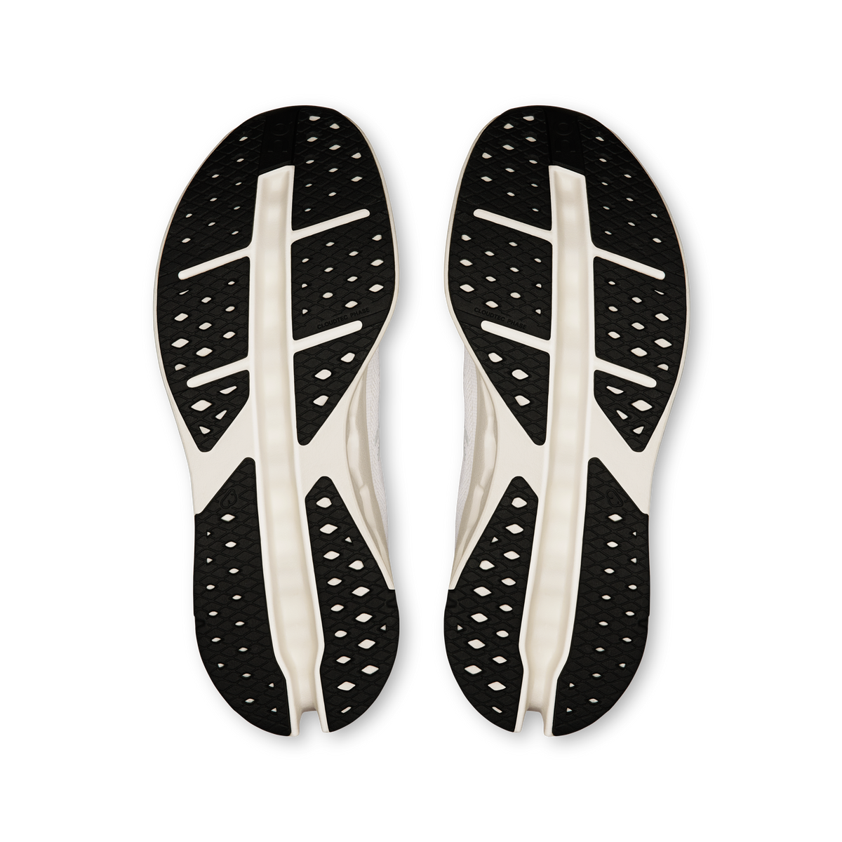On Cloudsurfer Max white shoe outsole, black traction pods with white support lines