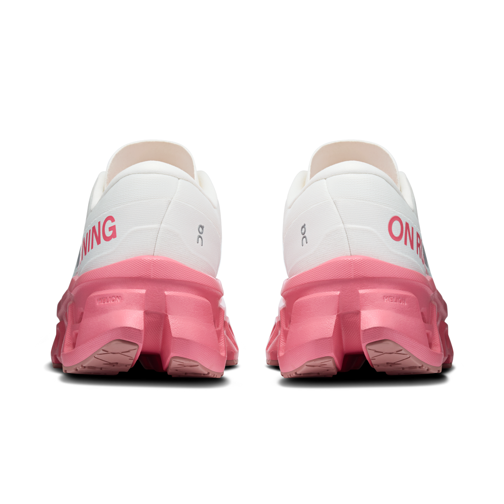 Ivory women's running shoes with pink heel and On logo on back