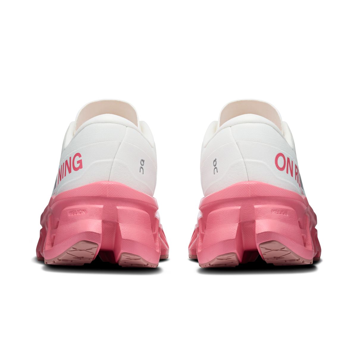 Ivory women's running shoes with pink heel and On logo on back