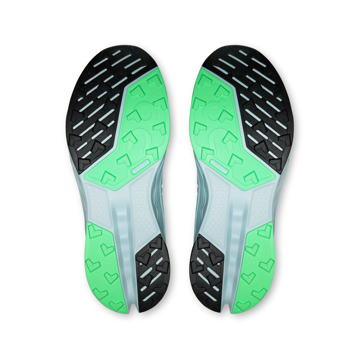 On women's trail shoe outsoles, green grip lugs with black traction sections