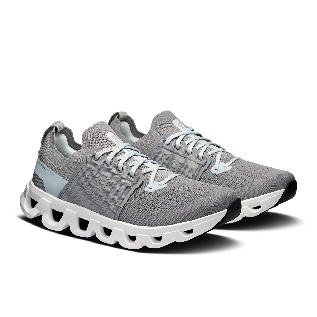 Men's gray lace-up running shoes with elastic collar and white outsole
