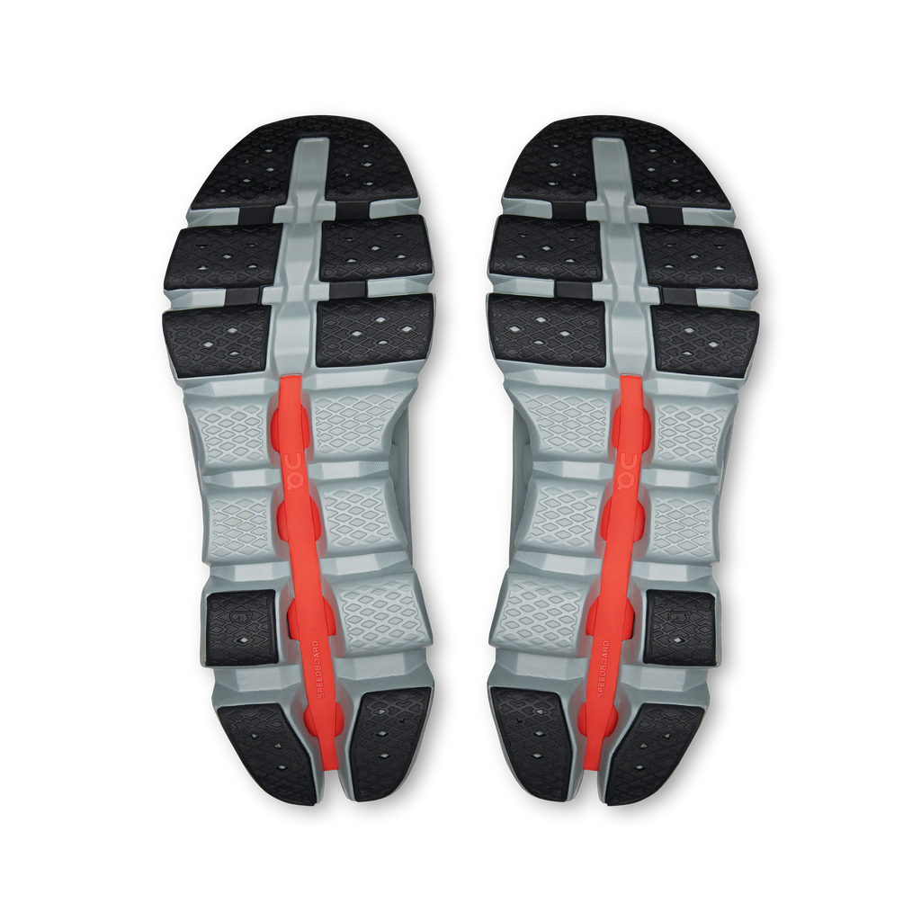 Outsoles of men's On Running Cloudswift Amp shoes with gray tread and red center stripes