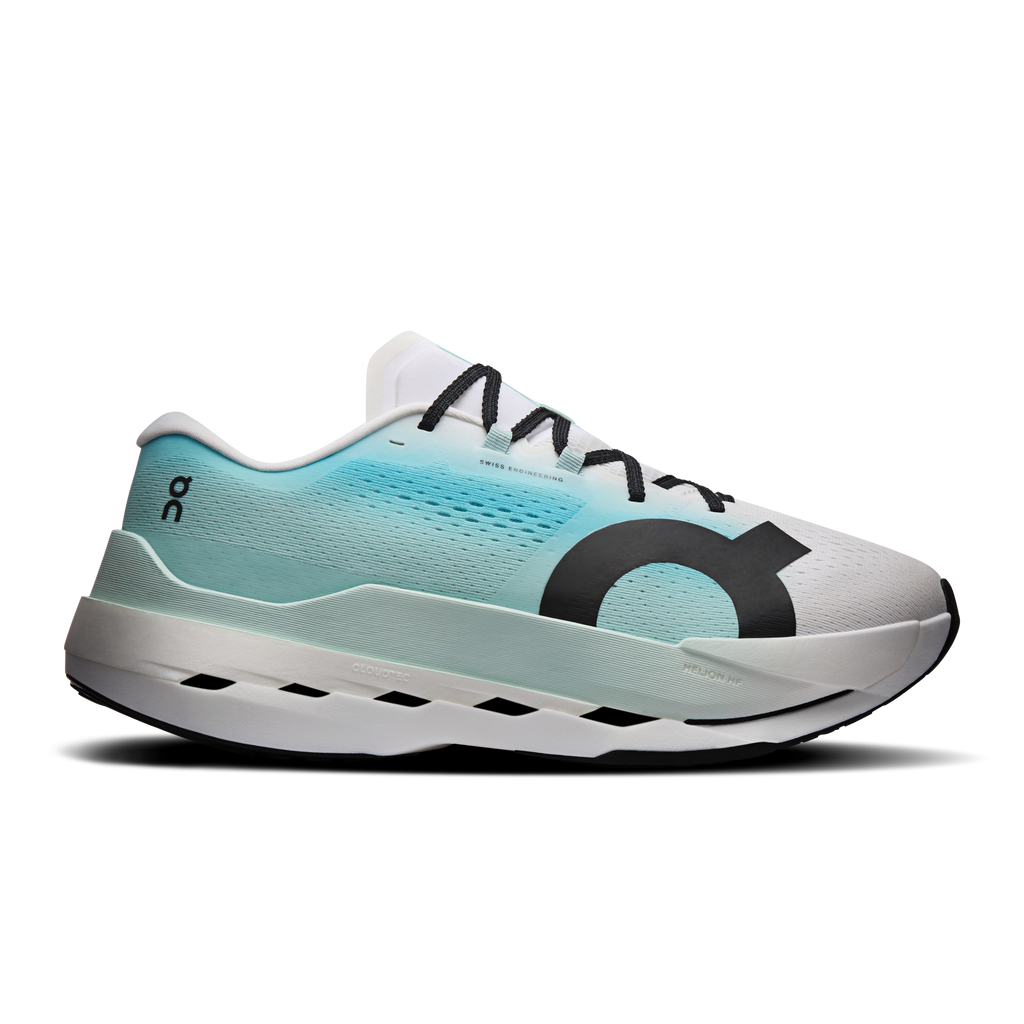 Men's white and teal running shoes with black laces and cushioned sole
