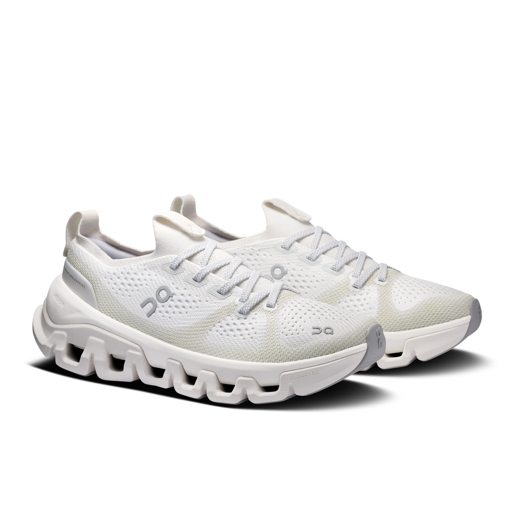 On Running Cloud X Tempo men’s running shoes, side view in ivory with cushioned sole
