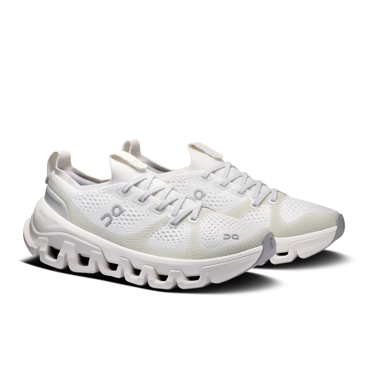 On Running Cloud X Tempo men’s running shoes, side view in ivory with cushioned sole