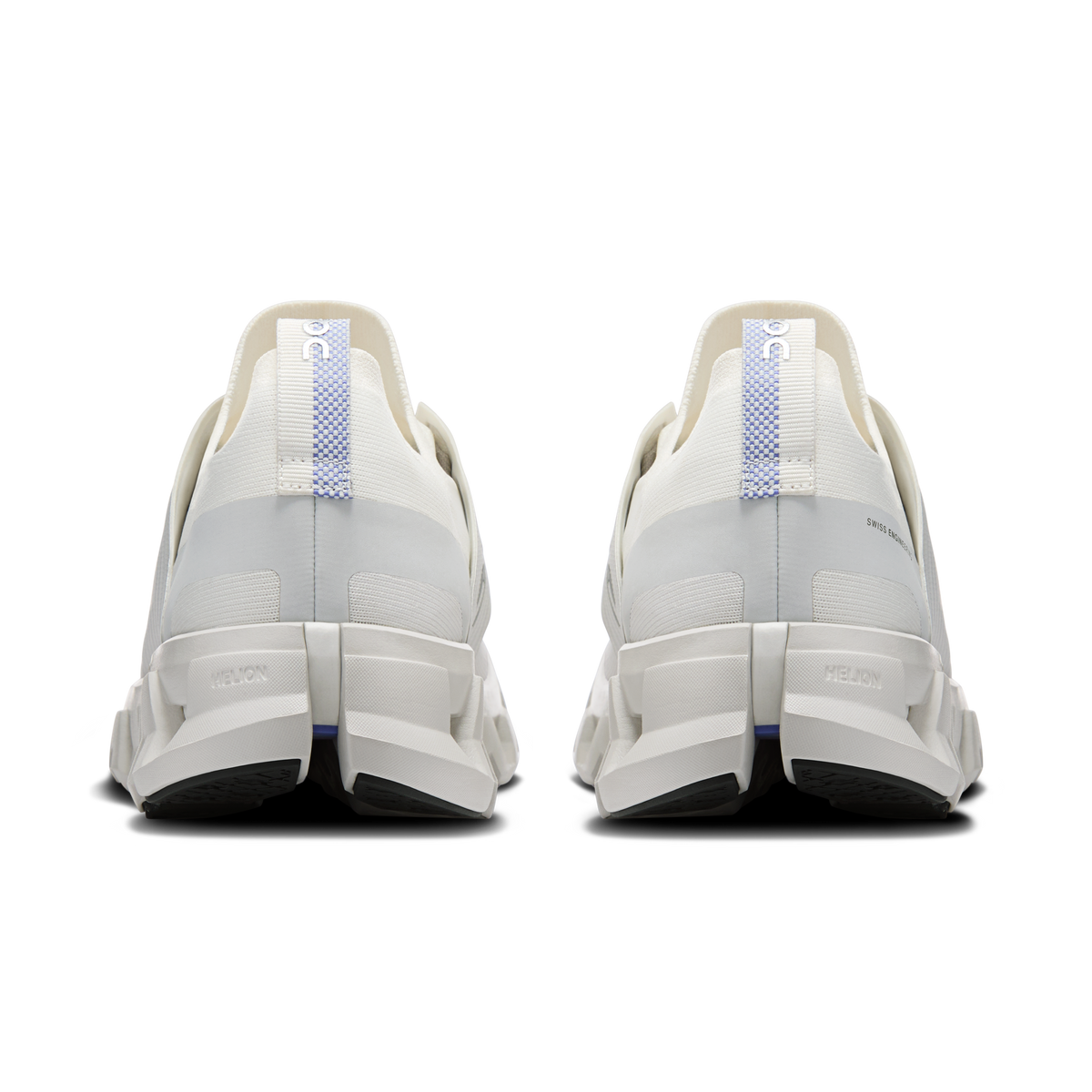 Ivory running shoes rear view with heel padding and blue pull-tab accents