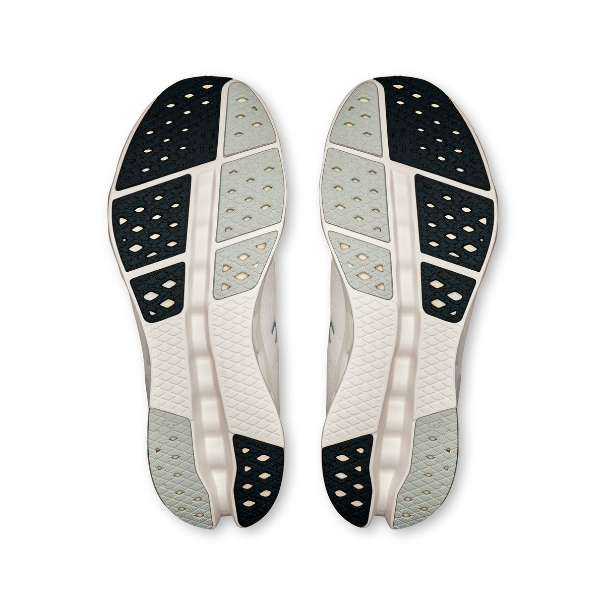 Pair of shoe outsoles, white rubber with black tread inserts and flex grooves