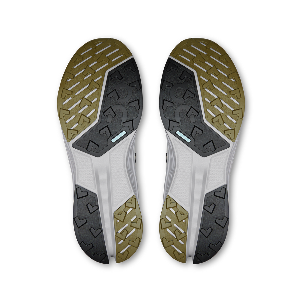 Men's trail running shoe outsoles, grippy tread with light and dark rubber panels