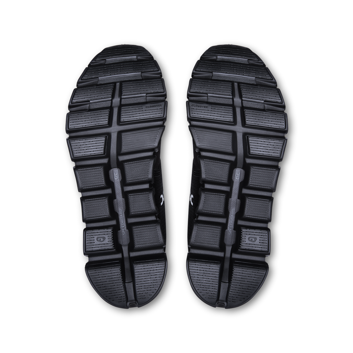 Pair of women’s waterproof running shoe outsoles with grippy tread pattern