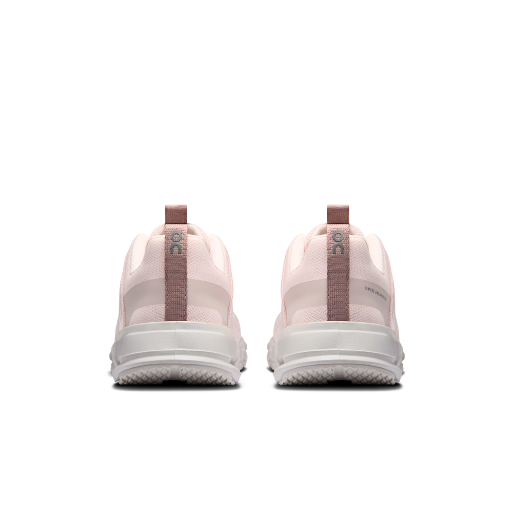 Kids' running shoes heel view, pale pink back with white sole and lace loops