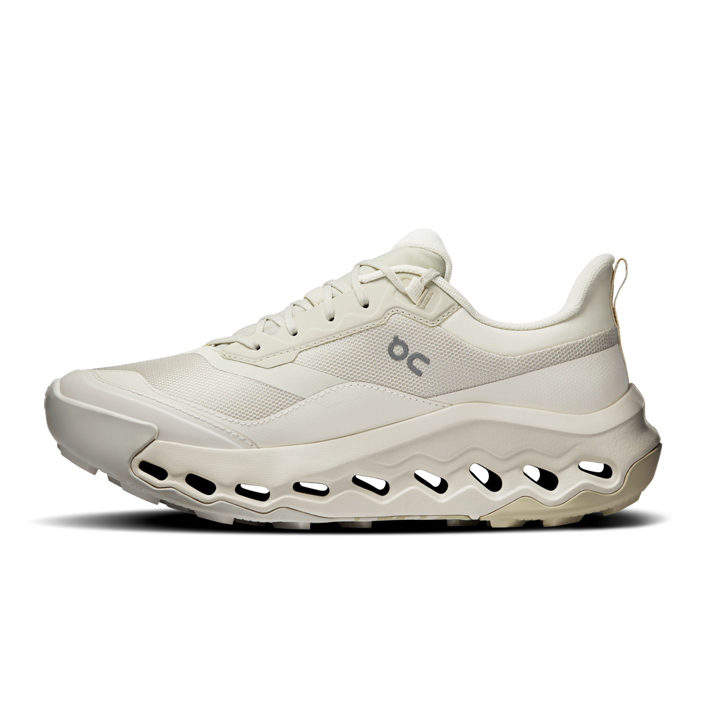 Women's waterproof running shoes, 3/4 side view, ivory upper and cushioned midsole