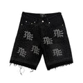 Men's black rhinestone denim shorts with embellished bow graphics, frayed hem