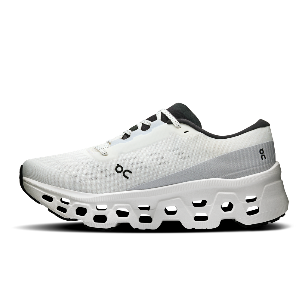 Women's white running shoes, side profile, lace-up with black ON logo accents