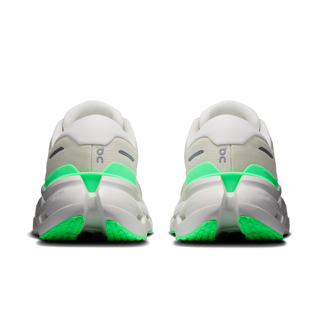 Women’s wide running shoes, back view with off-white uppers and neon green heel accents