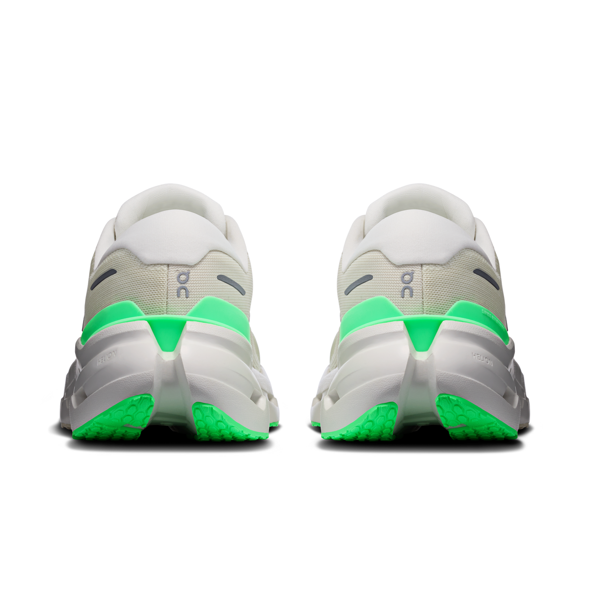 Women’s wide running shoes, back view with off-white uppers and neon green heel accents