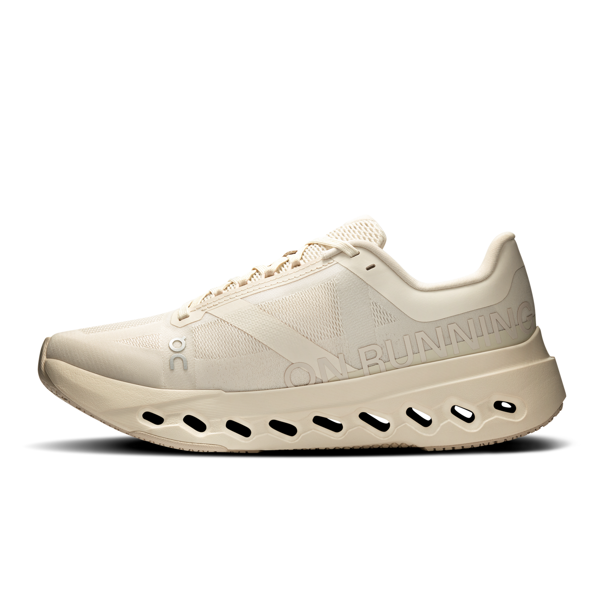 Women's running shoes, light beige knit upper with lace-up and CloudTec cutout midsole