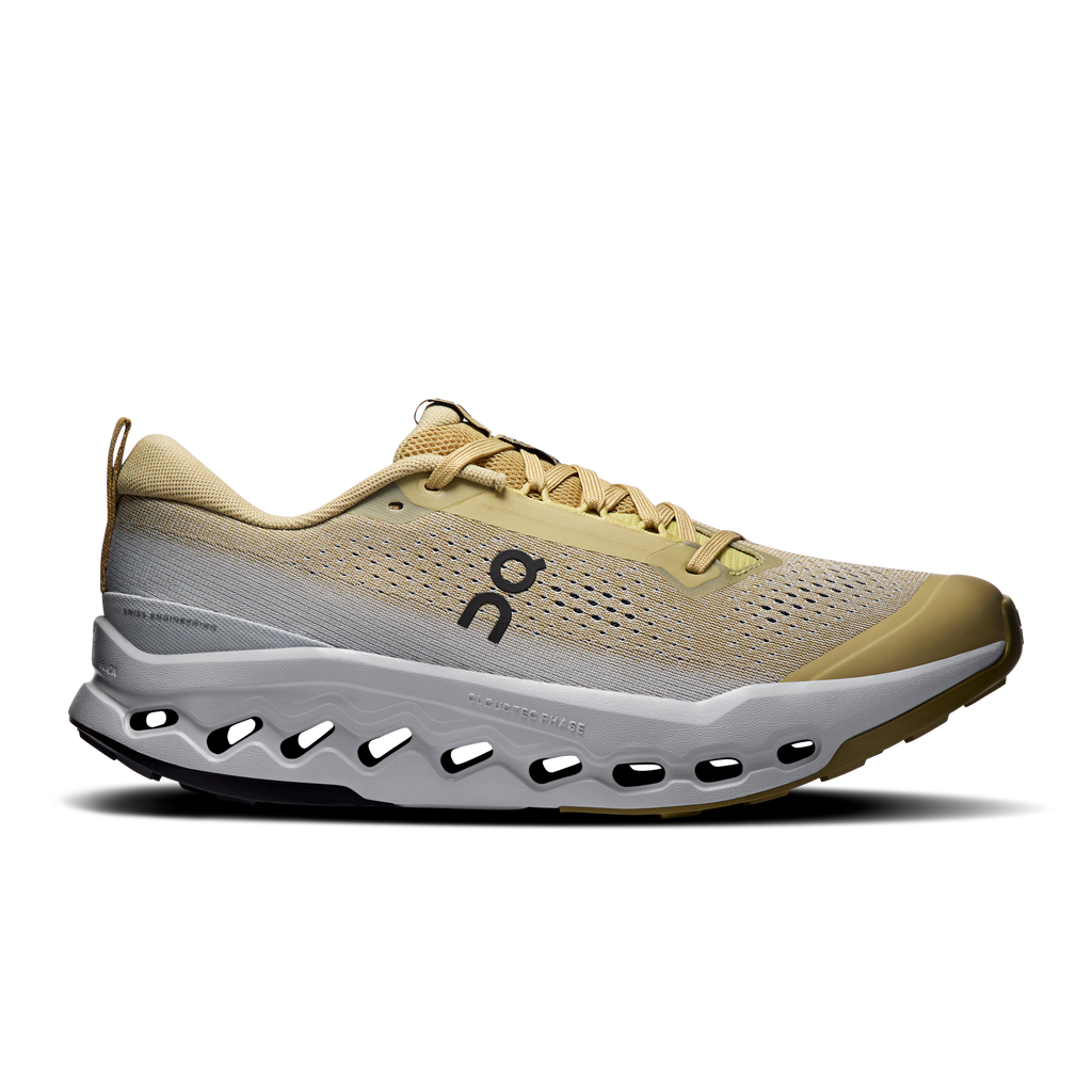 Men's trail running shoes, tan mesh upper with laces and white cushioned sole