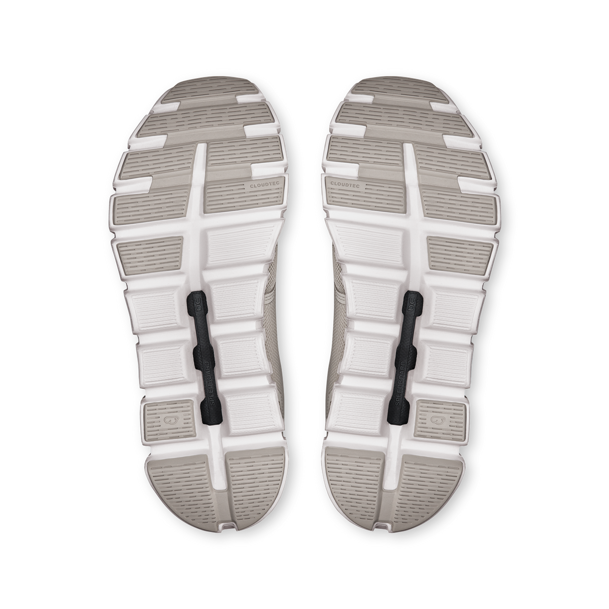 Pair of women's CloudTec shoe outsoles with patterned tread and white rubber base.