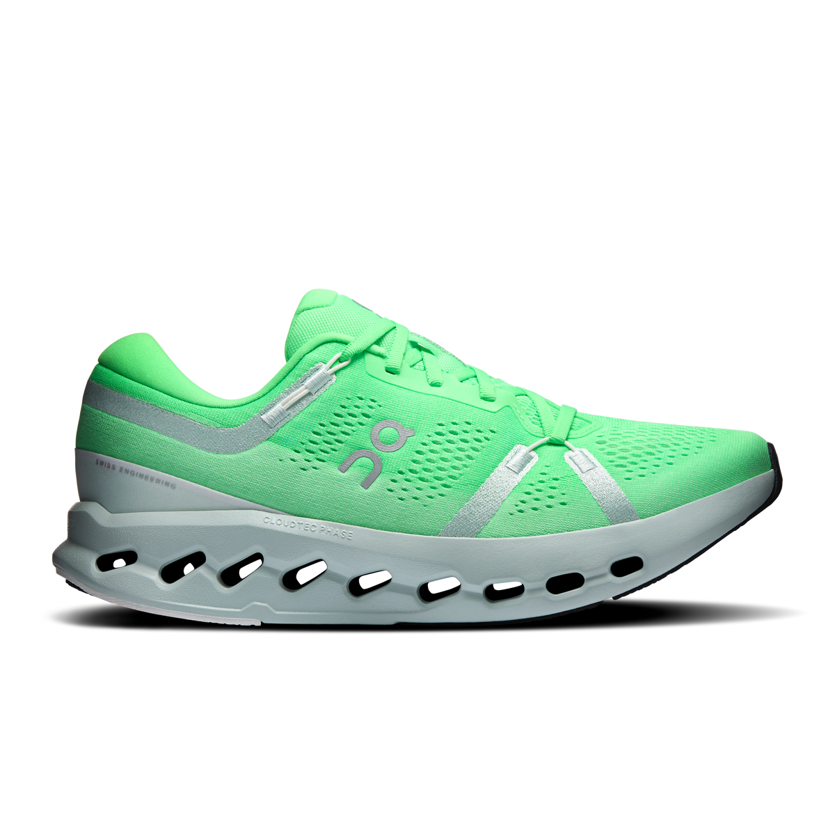 Men's green running shoes with silver side panels and black CloudTec sole pods