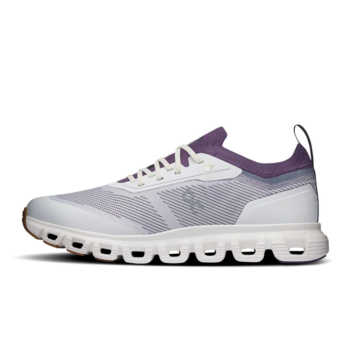 Ivory and purple low-top running shoe with lace-up closure and CloudTec midsole