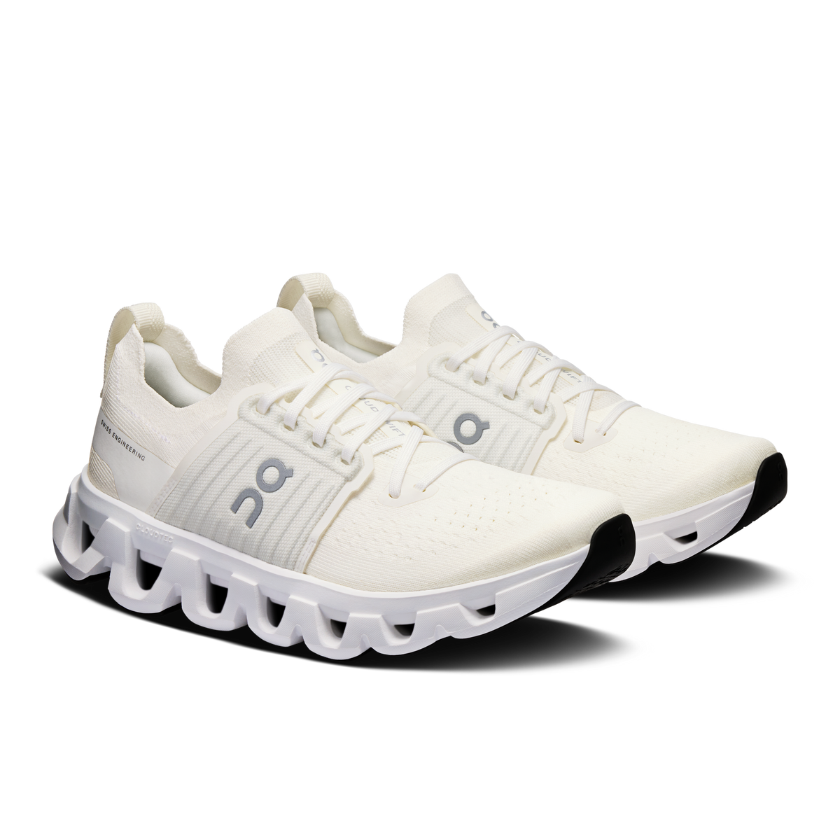 White lace-up running shoes with padded tongue, CloudTec sole pods, side logo