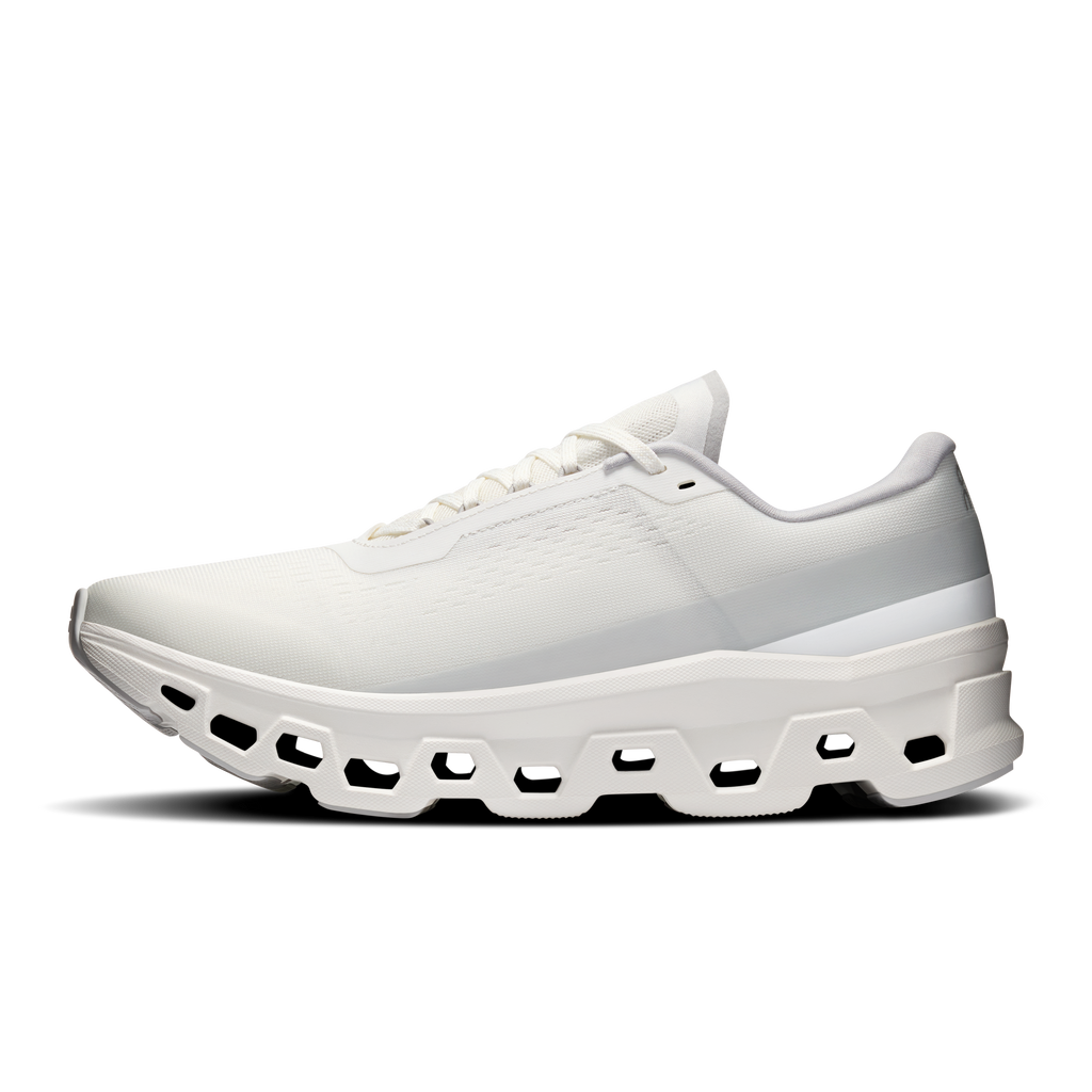 Men's white running shoes, low-profile side view with lace-up and pod sole