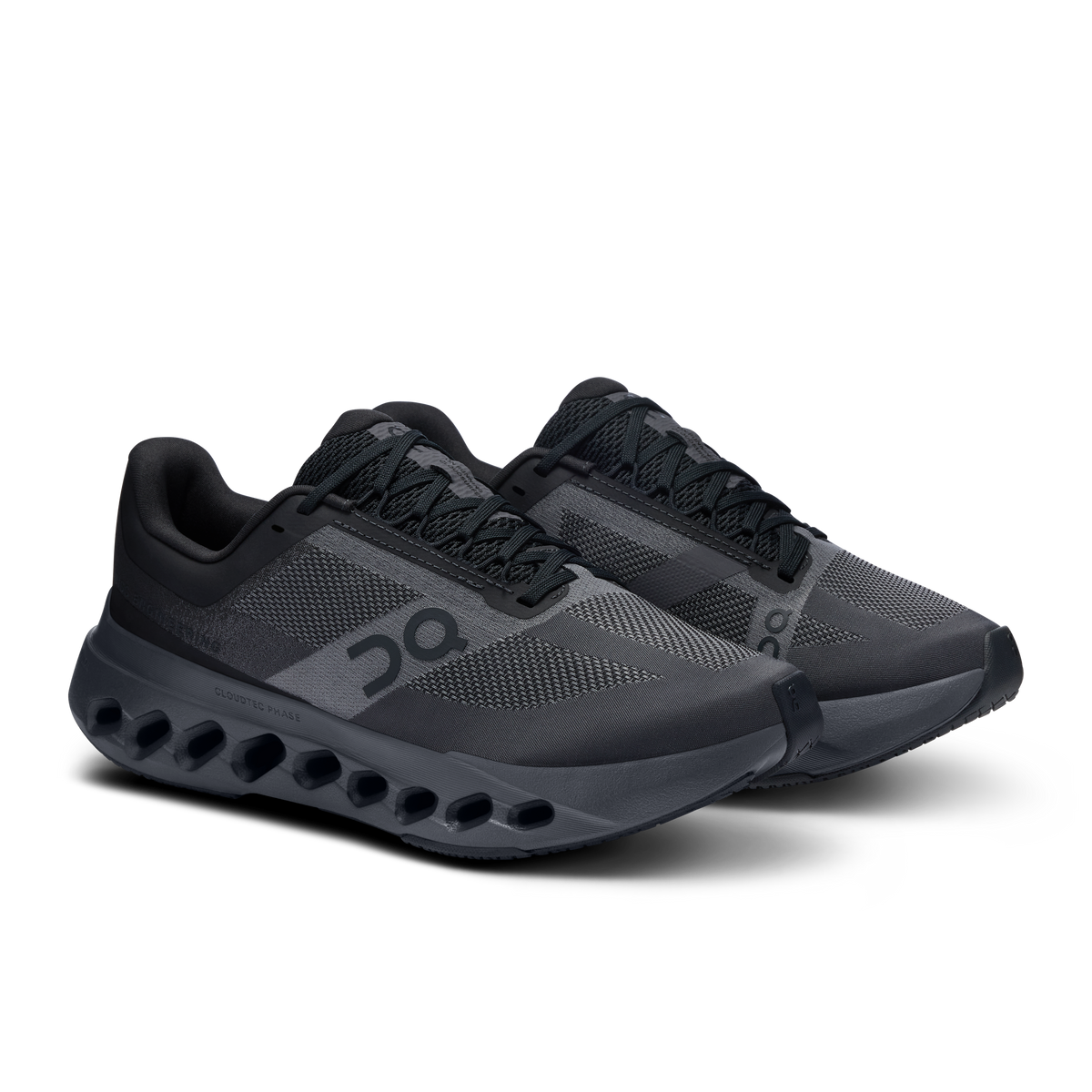 On Cloudsurfer Next running shoes, side view, black mesh upper with gray pods