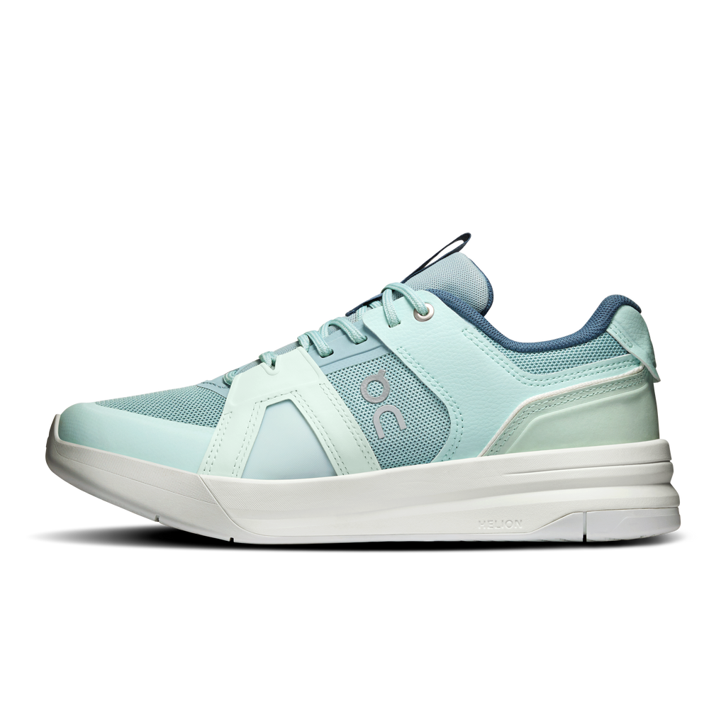 Women's mint and blue lace-up running shoe, quarter-side view with logo