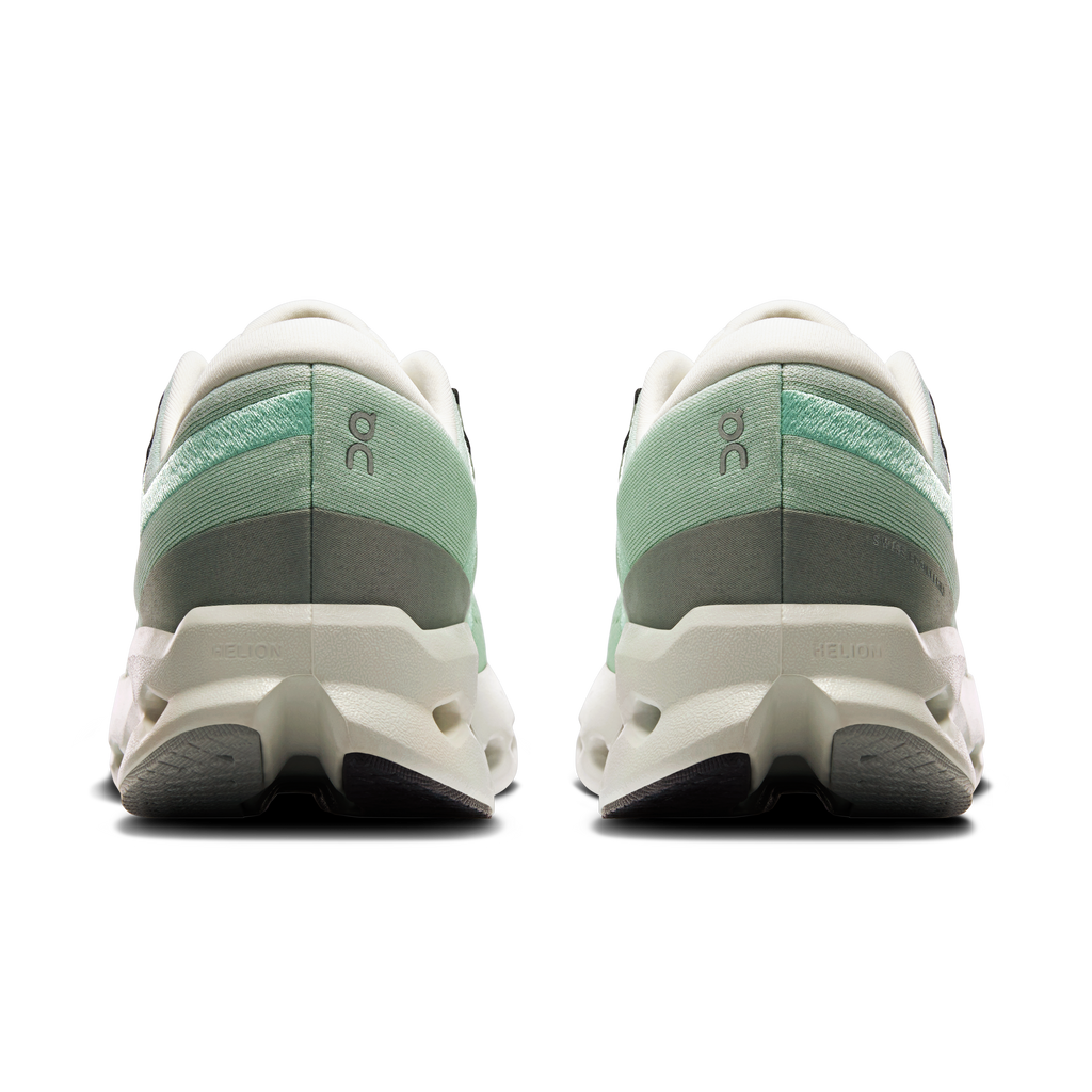 Women’s heel view of mint running shoes with cushioned CloudTec midsole pods