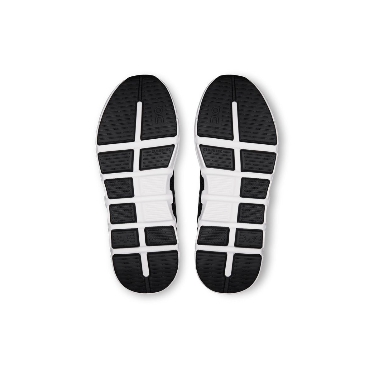 On Kids' Cloud Play 2 shoe outsoles, dark tread with white midsole