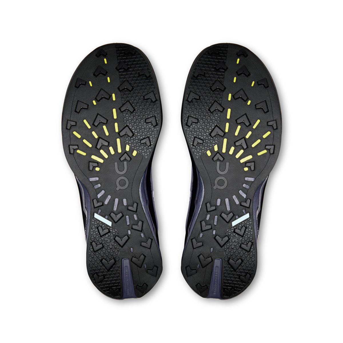 Shoe outsoles with black tread, yellow traction accents, and On branding