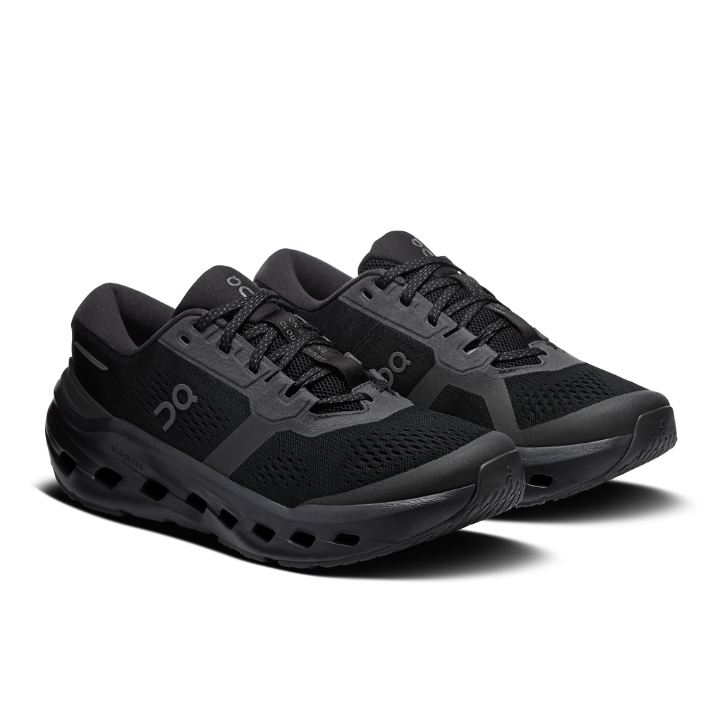 On Running wide running shoes in black, lace-up design with cushioned Cloud sole
