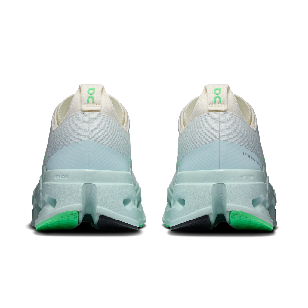 Women’s running shoes heel view, ivory collar with light-blue foam and green trim