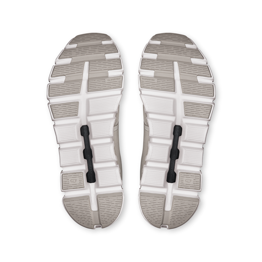 On Cloud 6 wide running shoe outsoles, white tread with molded CloudTec pods