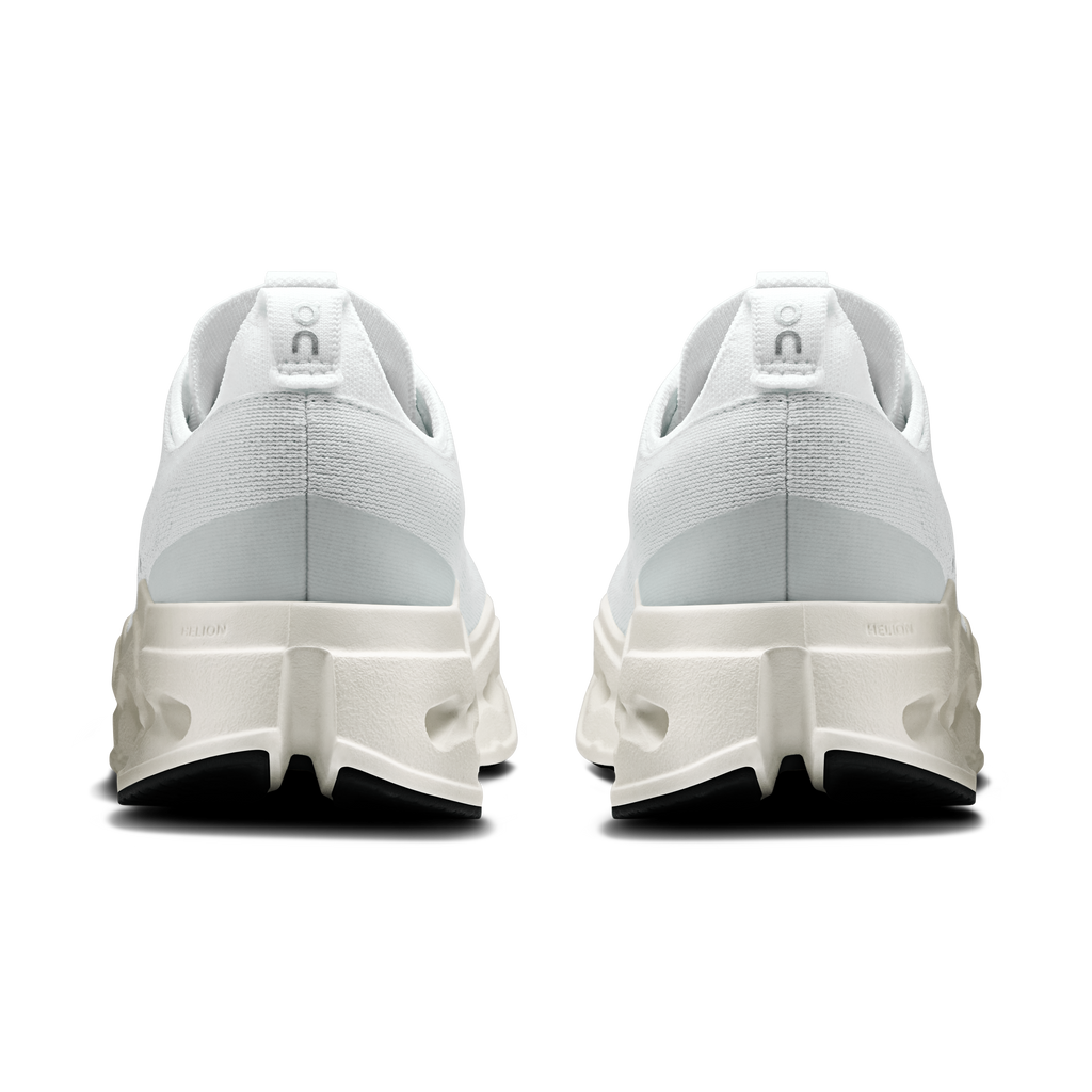 On women’s white heel view with padded collar and cushioned back panel