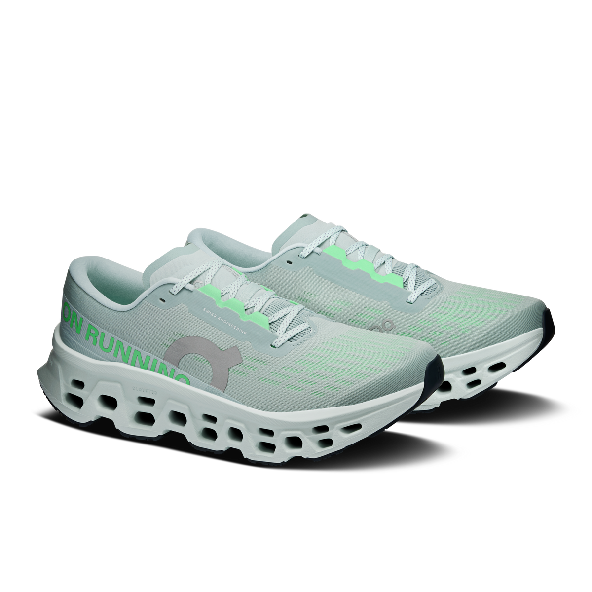 Pair of men's running shoes, light blue-green upper, green laces, CloudTec pods