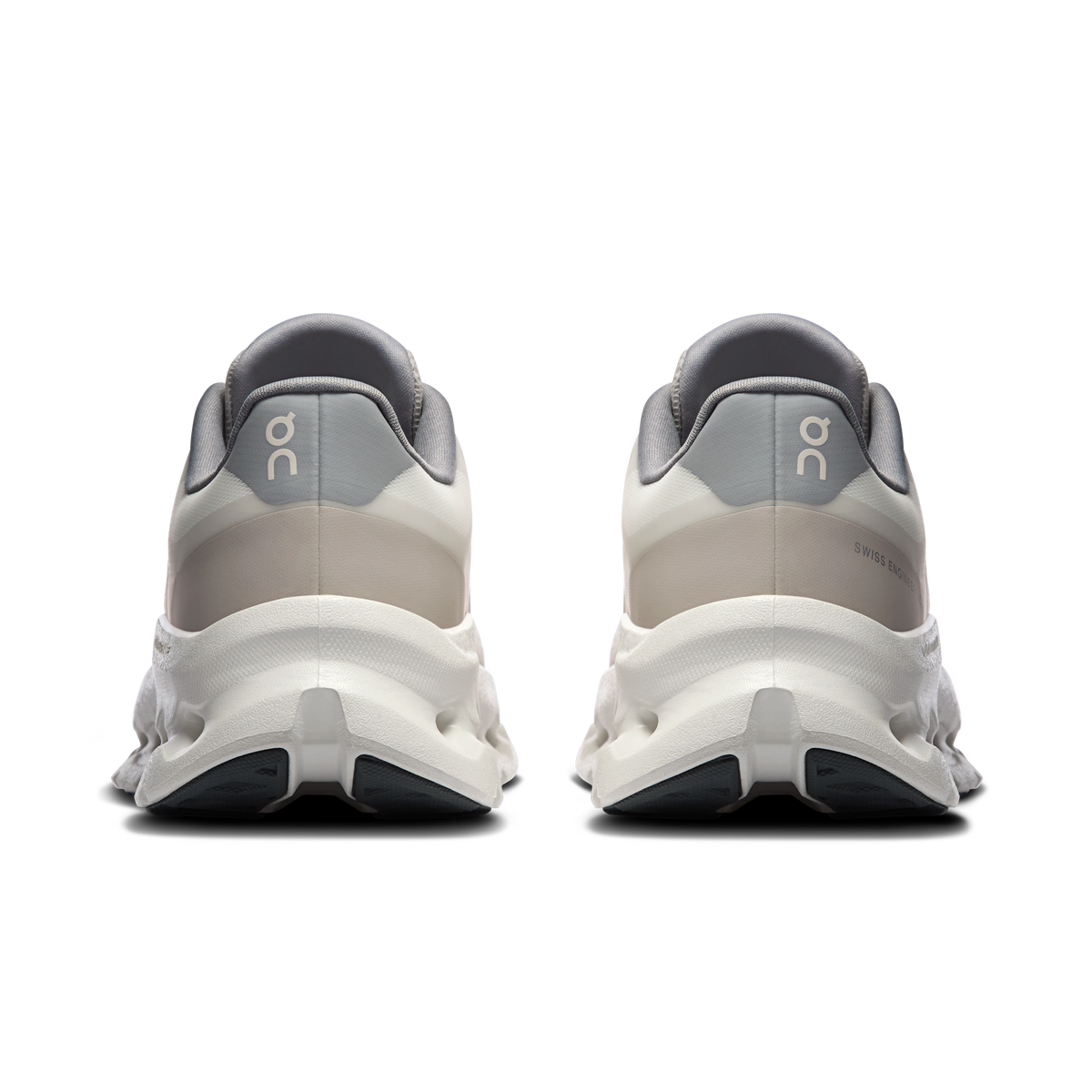 Women's heel view running shoes with padded collar, alloy accents, and cushioned sole