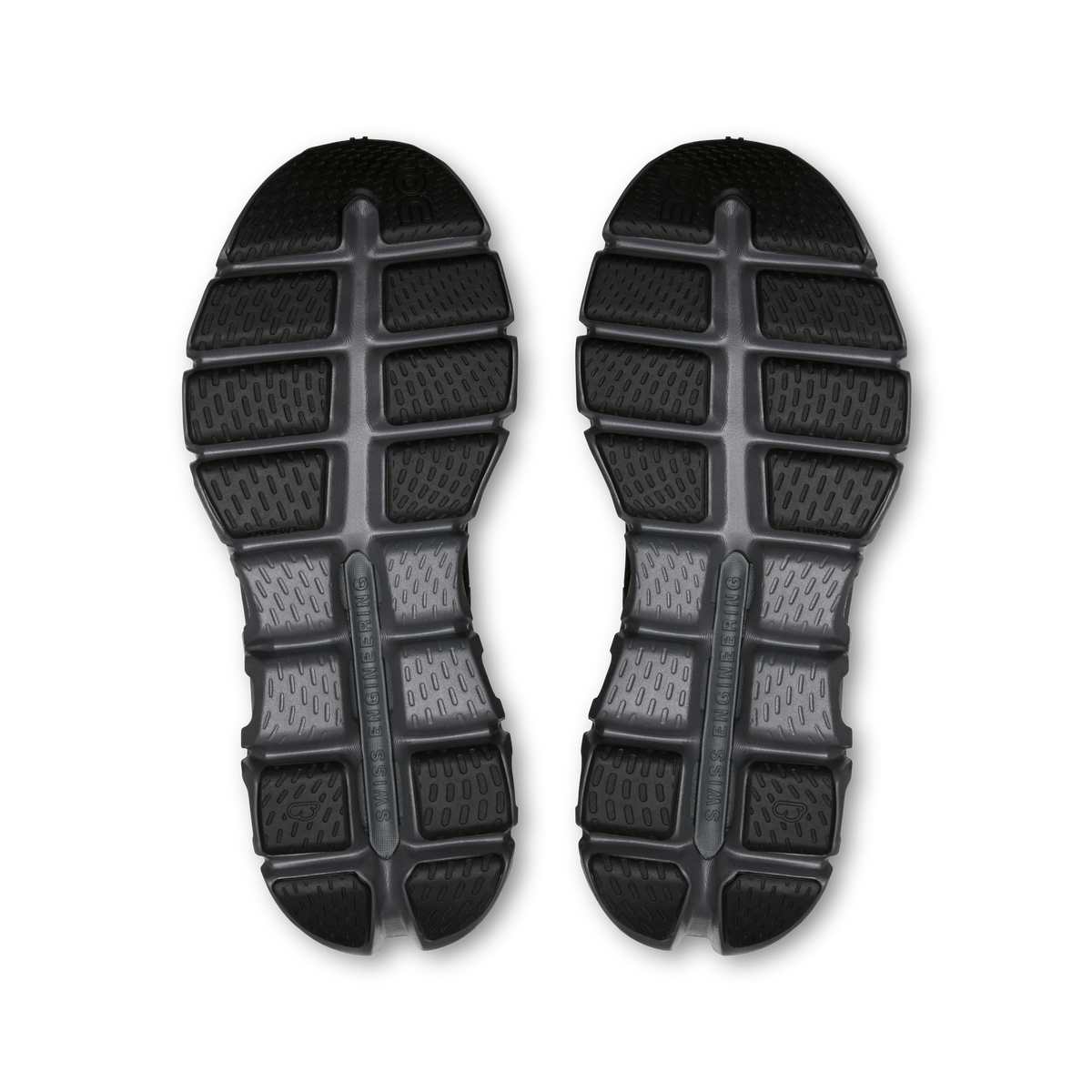 Black rubber outsole bottoms with grid tread pattern and raised center support