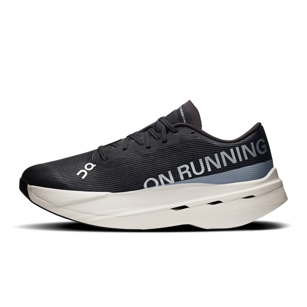 On men's running shoes, black upper with ON RUNNING text and white Cloud-style sole