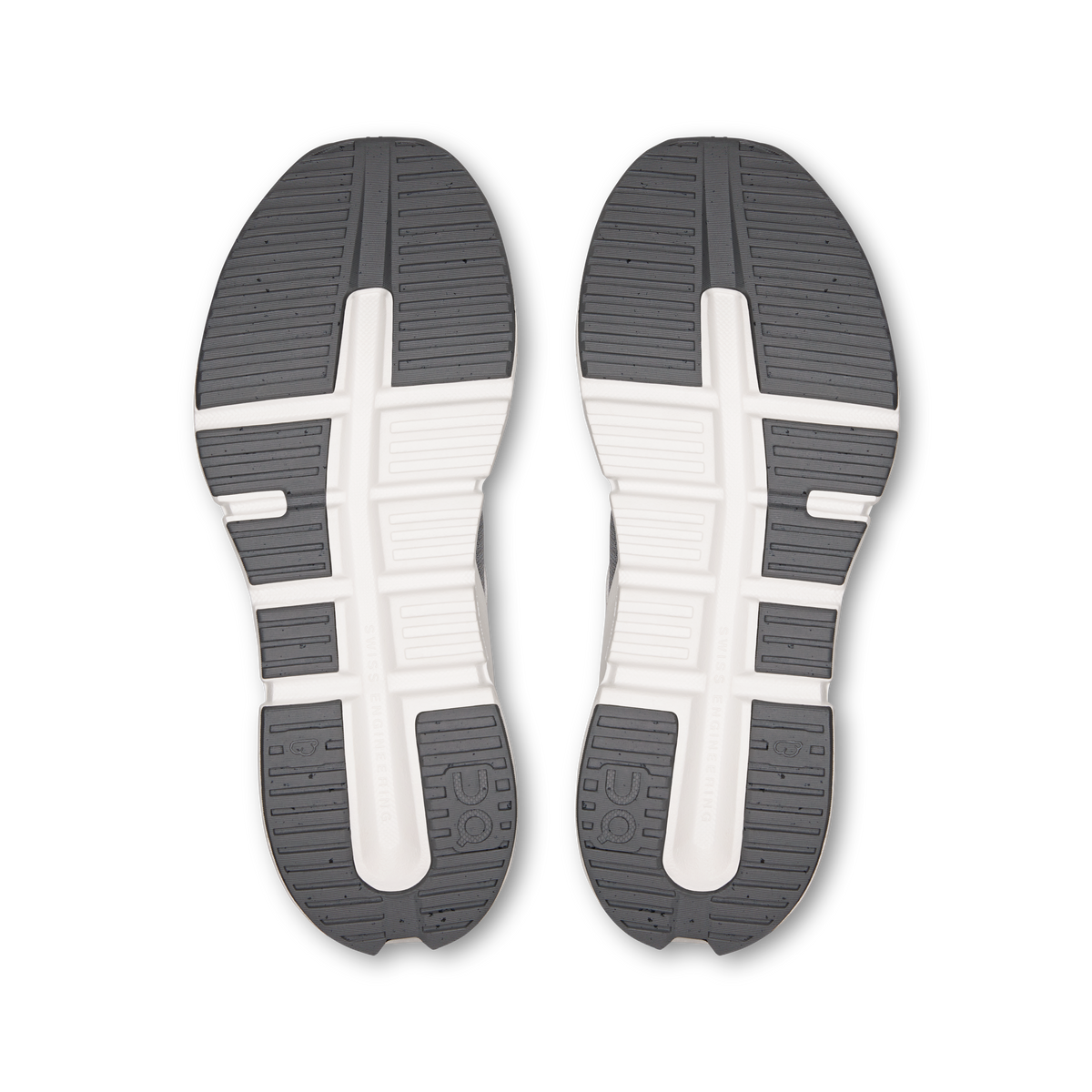 Shoe outsoles with tread pattern, white center cross, and dark rubber blocks