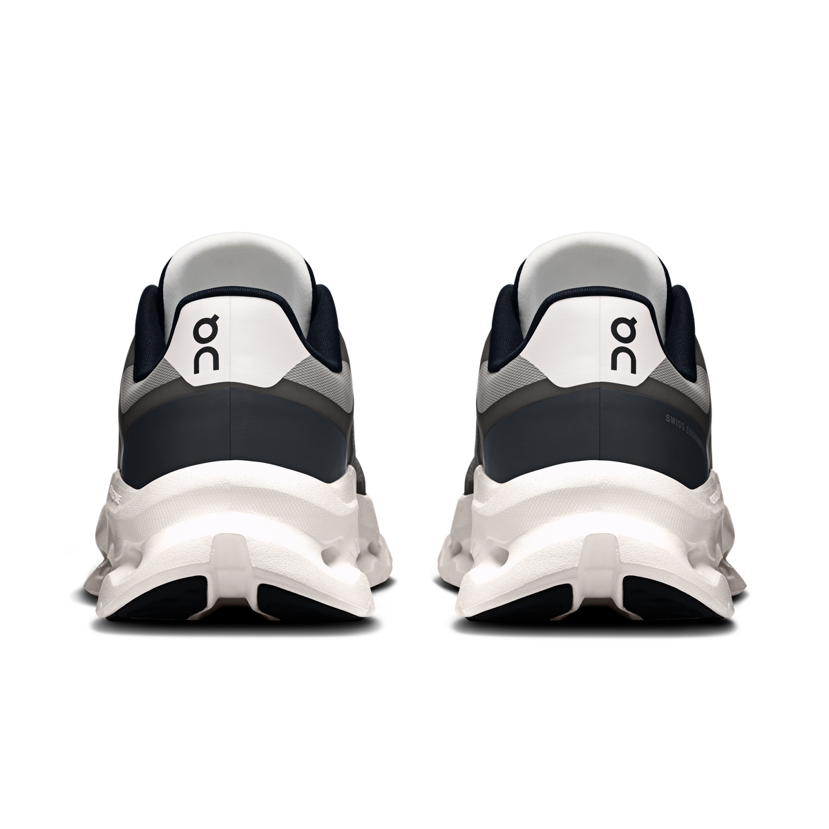 Back view of men's black and ivory running shoes with heel collar and rear cushioning