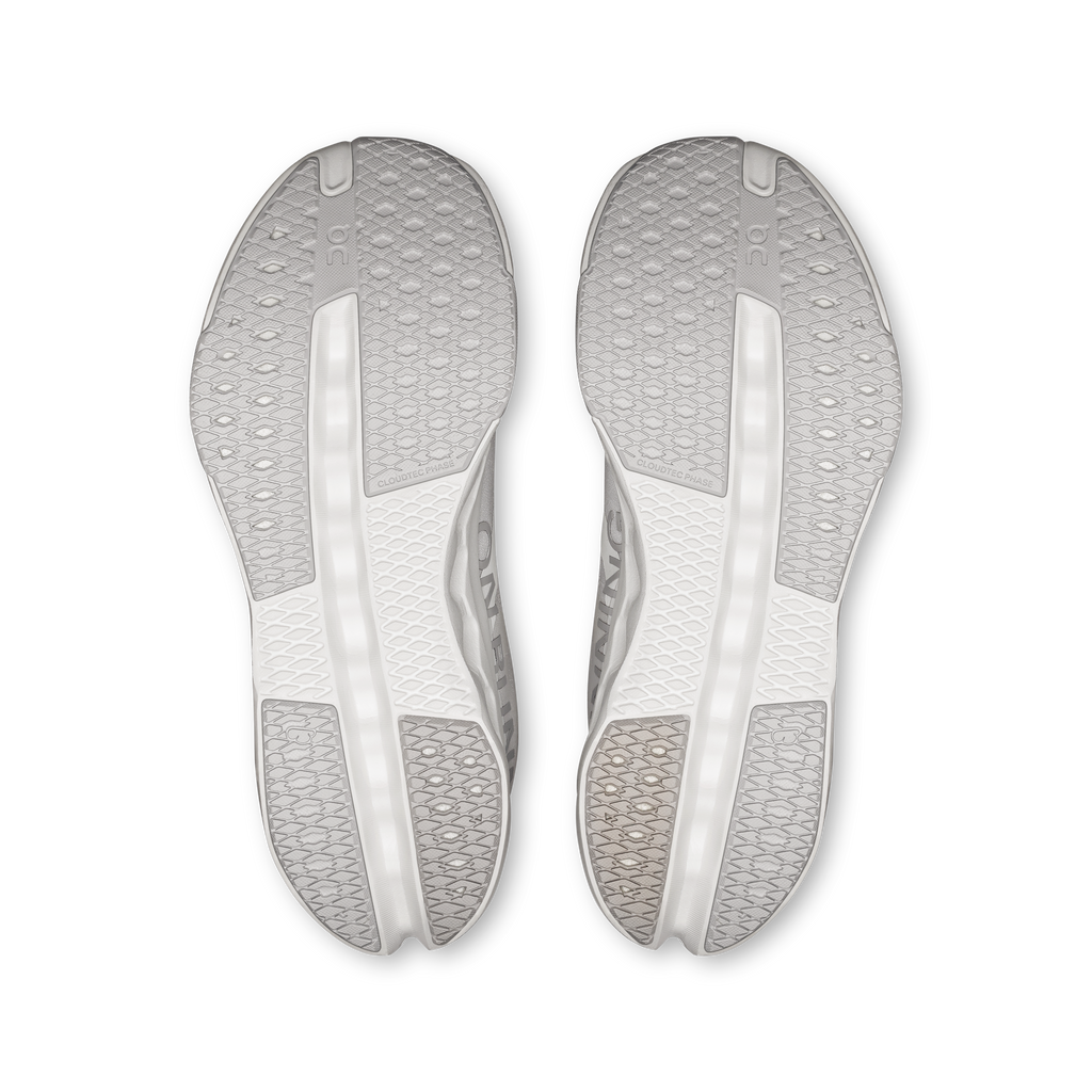 White women’s On Cloudsurfer outsoles, textured tread and dual support rails