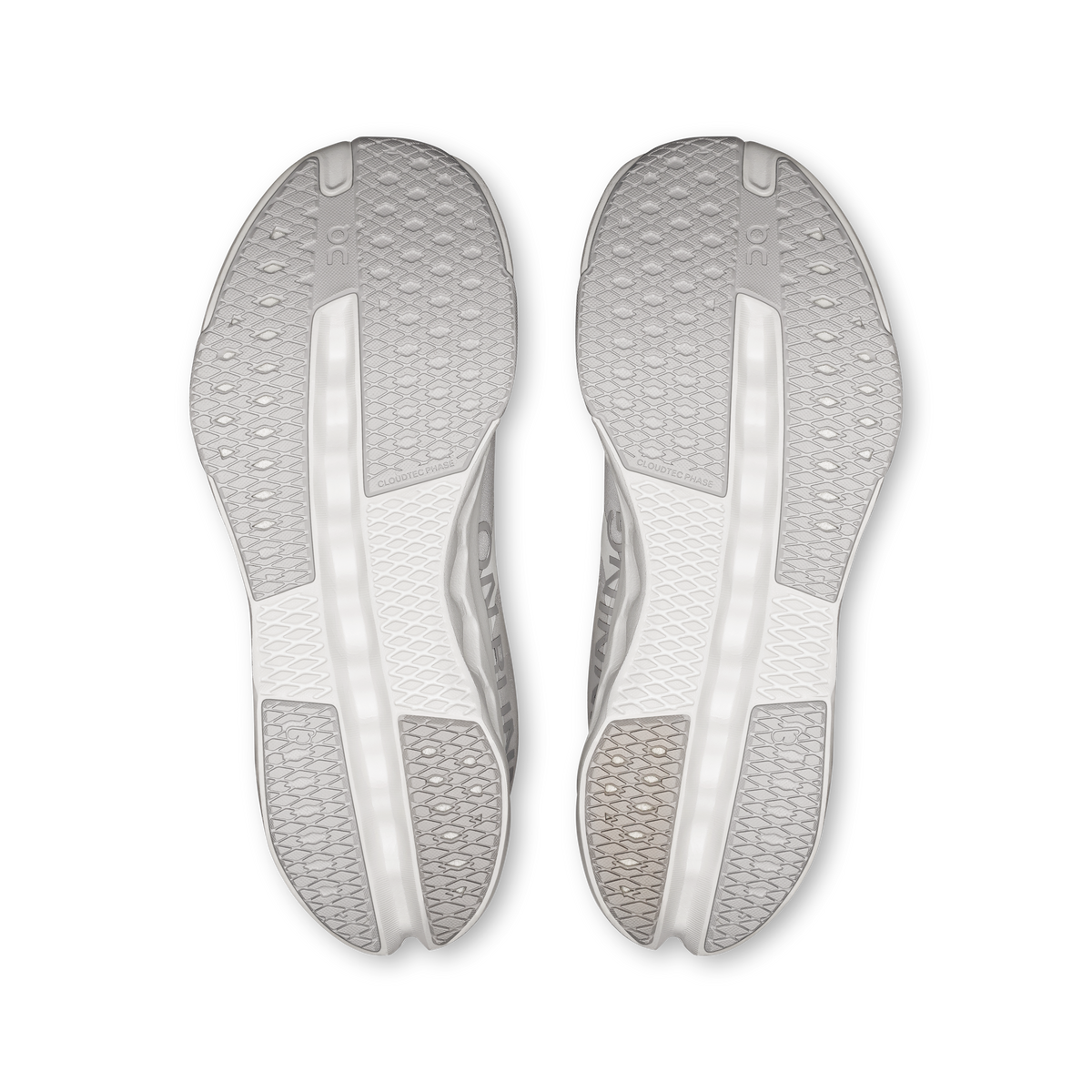 White women’s On Cloudsurfer outsoles, textured tread and dual support rails