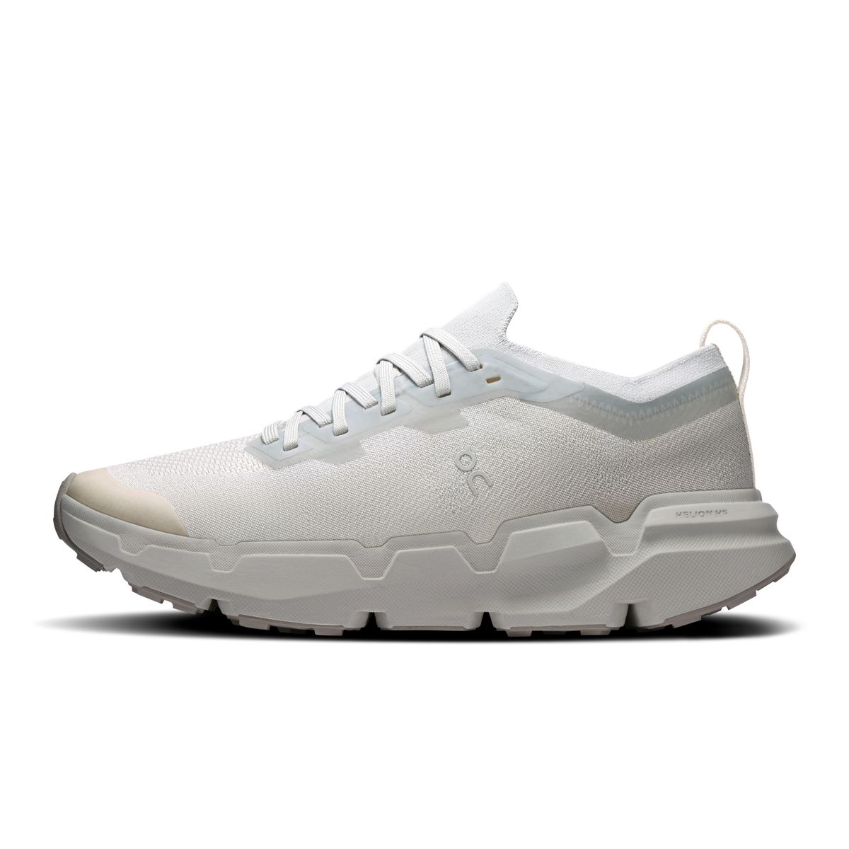 Women’s running shoes, side view of pearl knit upper with light-blue collar and white laces