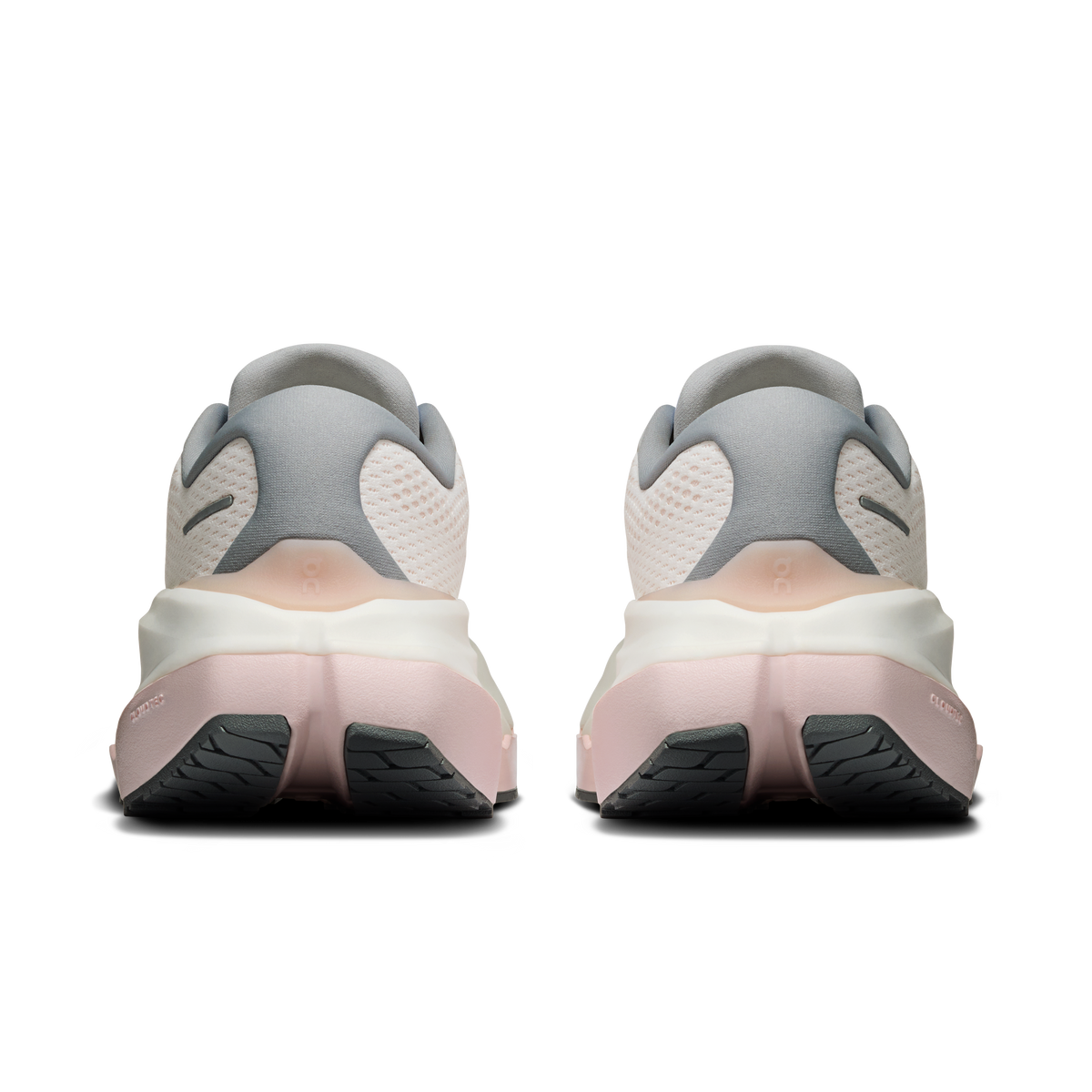 Heel and back view of white running shoes with gray collar and pink accents